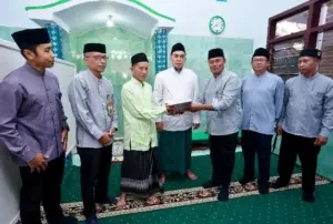 ASN Banyuwangi Khatamkan Al-Qur’an dan Wakafkan Ribuan Mushaf Foto BeritaJatim.com
