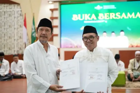 Jamin Keamanan Fungsionaris: BPJS Ketenagakerjaan Pasuruan dan PCNU Teken Kesepakatan Perlindungan Jamsostek Foto BeritaJatim.com