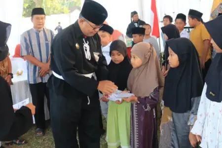 Sambut Bulan Muharam, PSHT Kota Blitar Gelar Santunan dan Tebar Kepedulian untuk Warga Foto BeritaJatim.com